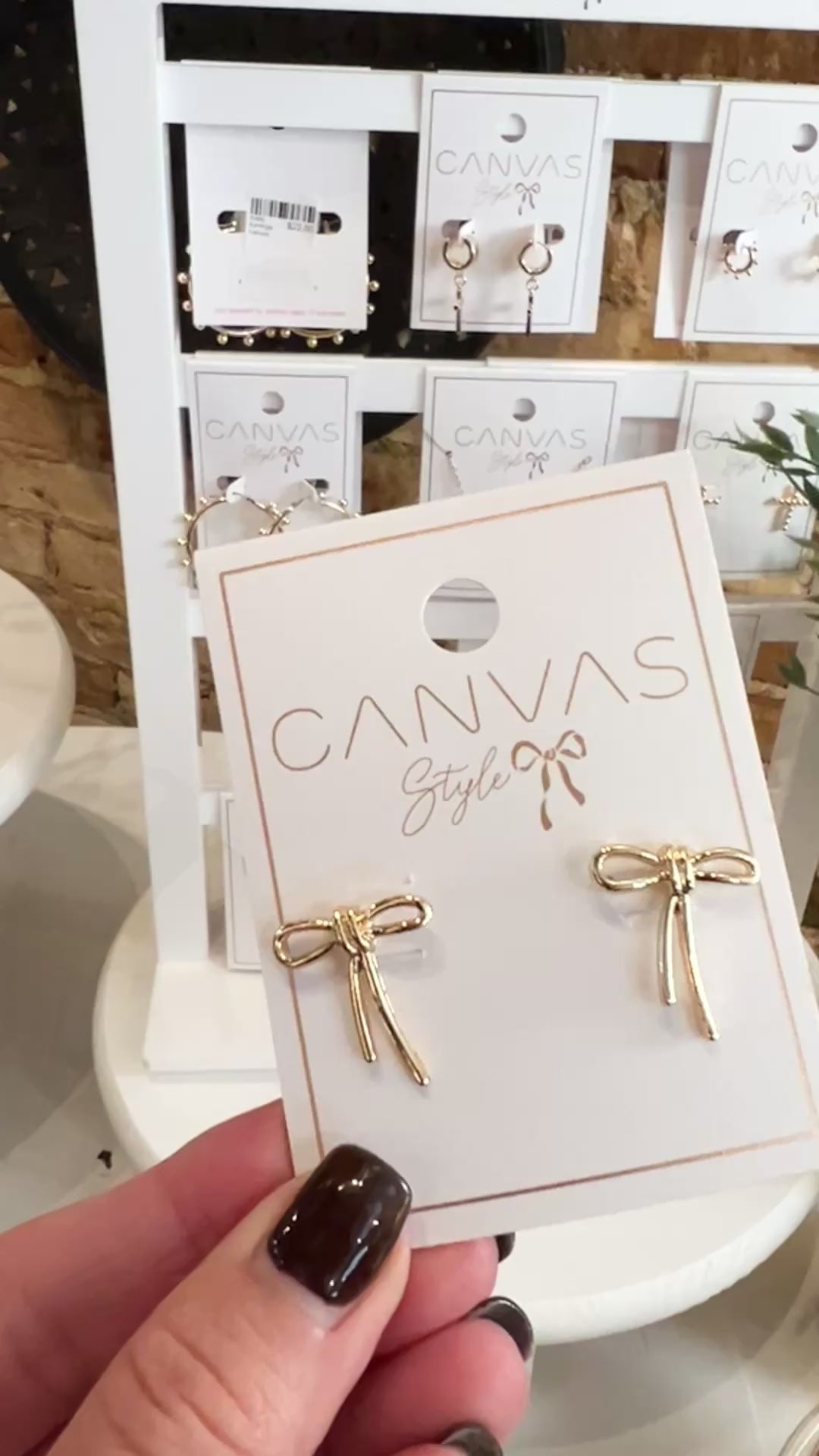 Lopsided Bow Stud Earrings in Shiny Gold